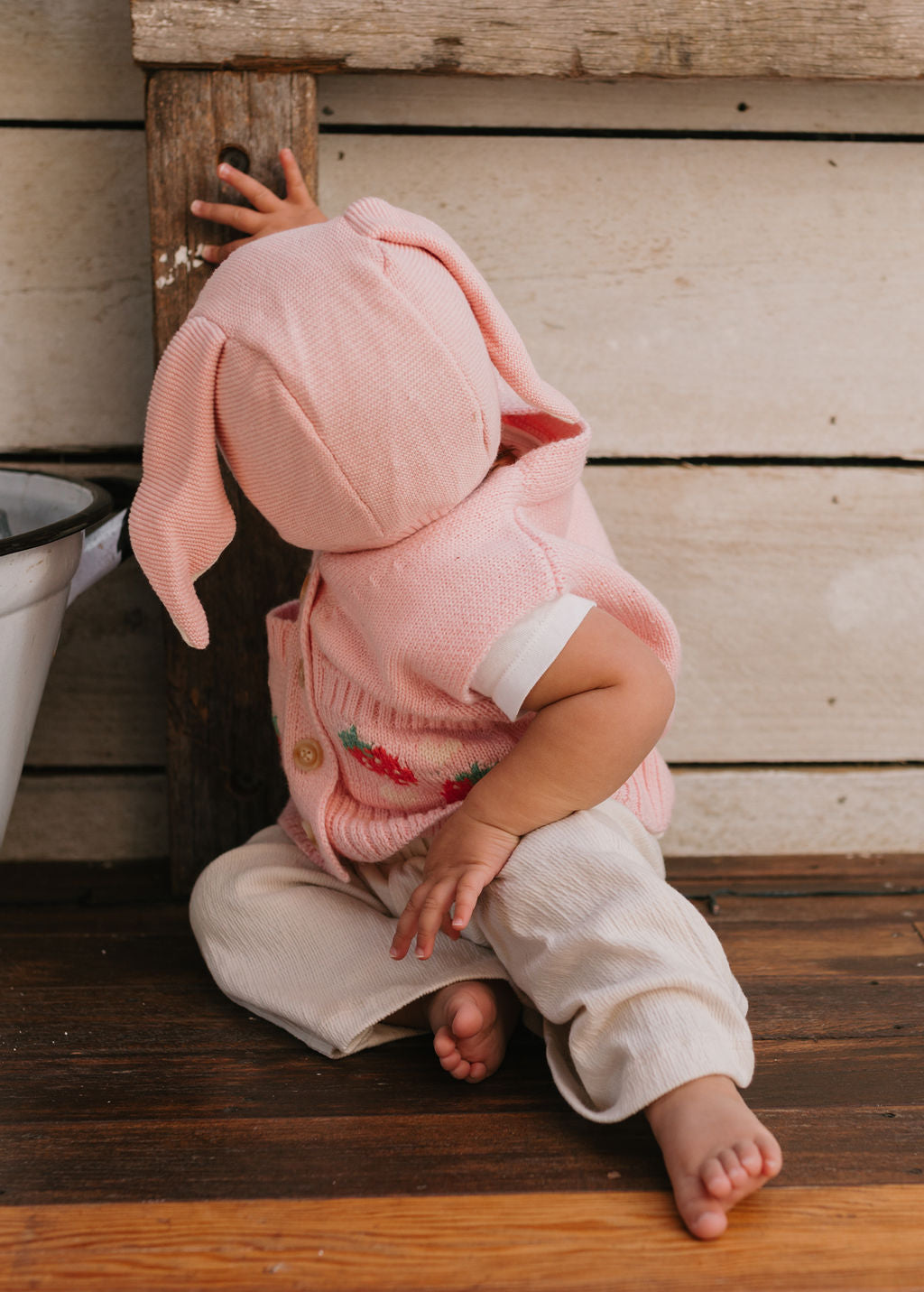 Bunny Beanie Pink – baby and toddler cotton beanie with floppy bunny ears and tie straps on baby back view – Acorn Kids