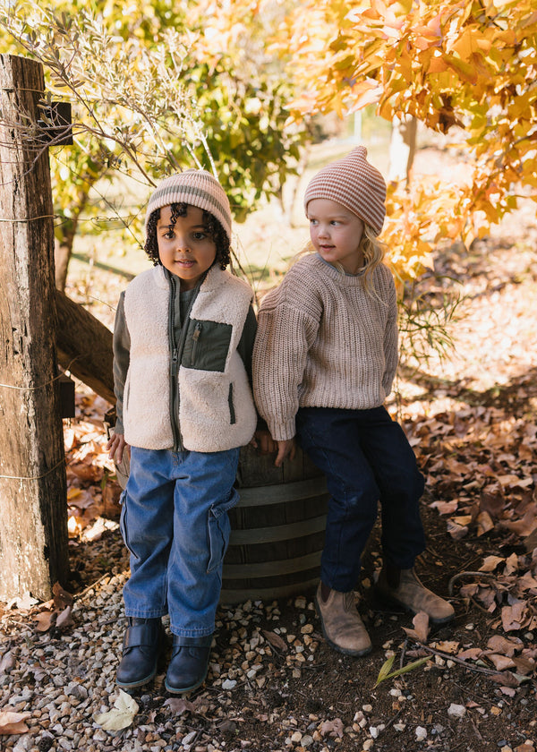 Tokyo Merino Beanie Sage Stripe on child front view – kids knitted merino wool beanie with fisherman rib and stripe design – Acorn Kids