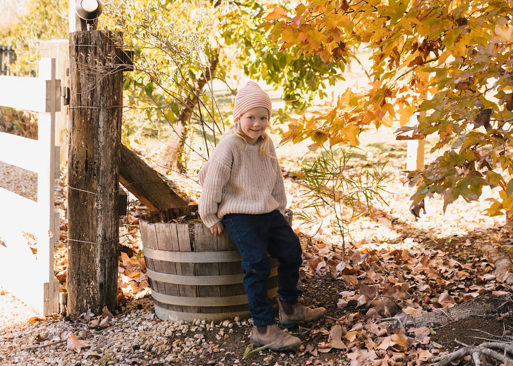 Berlin Merino Beanie Biscuit & Cream Stripe on child front view – kids knitted merino wool striped beanie with pointed top – Acorn Kids