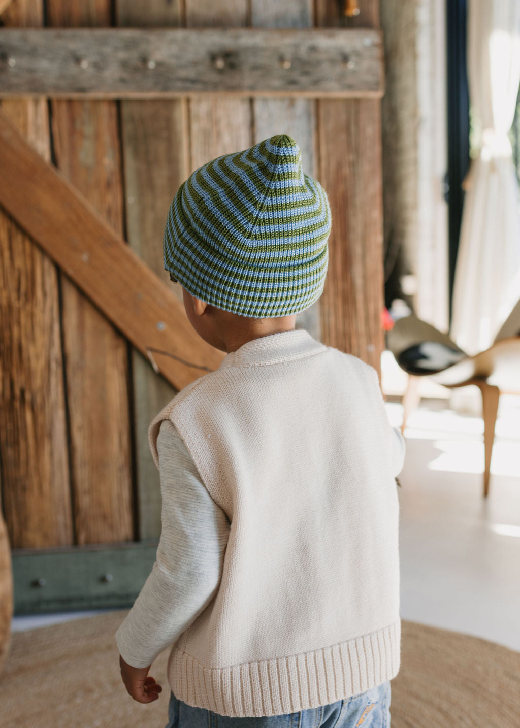 Berlin Merino Beanie Green & Blue Stripe on child back view – kids knitted merino wool striped beanie with pointed top – Acorn Kids