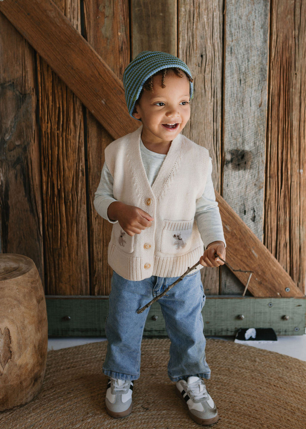 Berlin Merino Beanie Green & Blue Stripe on child front view – kids knitted merino wool striped beanie with pointed top – Acorn Kids