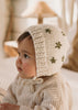 Daisy Bonnet – baby knitted bonnet with daisy flower design in soft wool blend – Acorn Kids