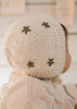 Daisy Bonnet – baby knitted bonnet with daisy flower design in soft wool blend – Acorn Kids