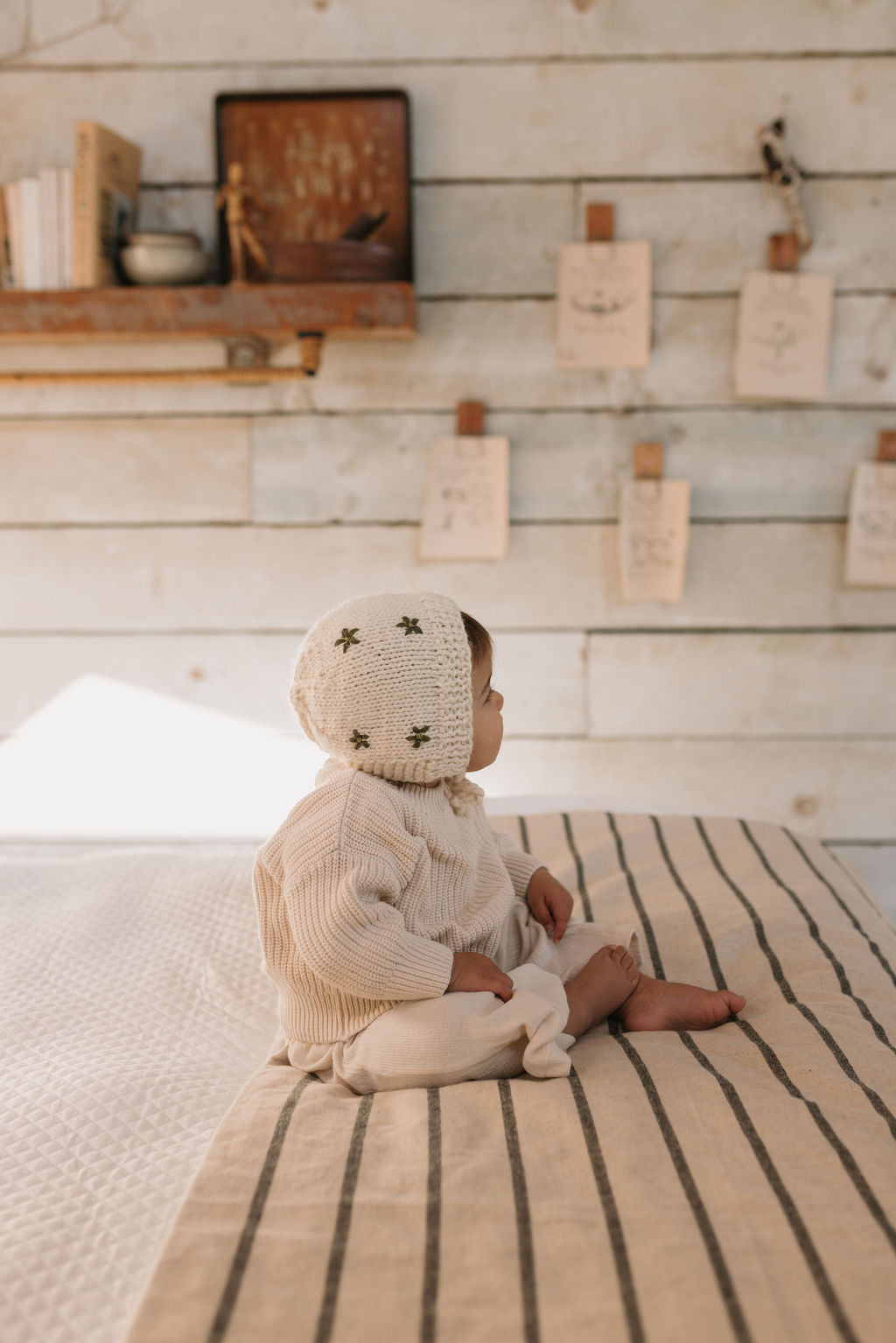 Daisy Bonnet – baby knitted bonnet with daisy flower design in soft wool blend – Acorn Kids