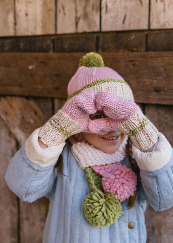 Teddy Beanie and Mittens Pink & Green on child – hand-knitted kids mittens with cosy ribbed cuffs and cute stripe detail – Acorn Kids