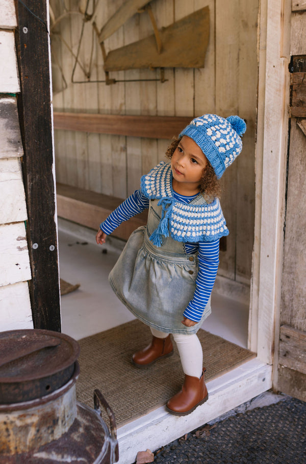 Boho Collar Beanie and Collar Blue on child side view – kids hand-crocheted beanie and scarf with retro stripes and scalloped edge – Acorn Kids