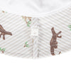 Close-up of a baby hat's interior lining, featuring a white and beige diagonal stripe pattern with brown kangaroo silhouettes and small green leaf accents, secured by a white safety release snap clip.