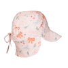 A light pink sun hat for children featuring a playful pattern of orange bows, blue bows, and small floral motifs. The hat includes a wide brim, a chin strap with ties, and a neck flap.